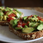 avocado and tomatoes on dave's killer bread